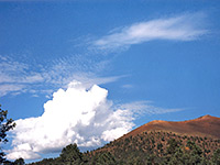 Thundercloud above a cinder cone