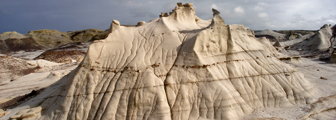 Striated sandstone mound at the Bisti Badlands