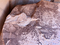 Petroglyphs on a boulder