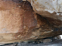 Petroglyphs around a cave