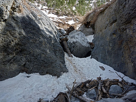 Boulder and snowdrift